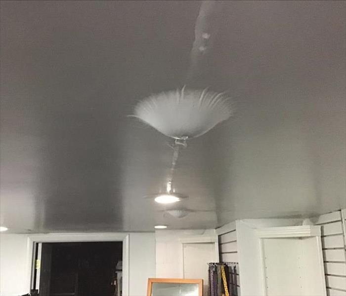 Ceiling bubbles due to water being trapped inside